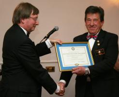 District Governor Martin Greaves presents new Charter to Rotary Club of Royal Wootton Bassett President Stephen Walls